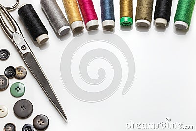 Copy space frame with sewing tools and accessories on white background Stock Photo