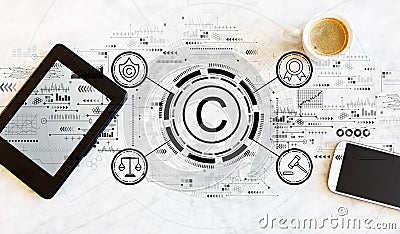 Copyright concept with tablet and phone Stock Photo