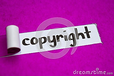 Copyright text, Inspiration, Motivation and business concept on purple torn paper Stock Photo