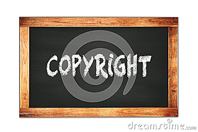 COPYRIGHT text written on wooden frame school blackboard Stock Photo