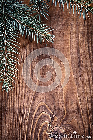 copyspace christmas background branches of fir tree on old wooden board Stock Photo