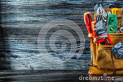 Copyspace image set of construction tools in leather toolbelt Stock Photo