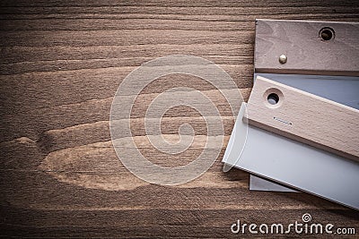 Copyspace view steel and rubber putty knifes close up Stock Photo