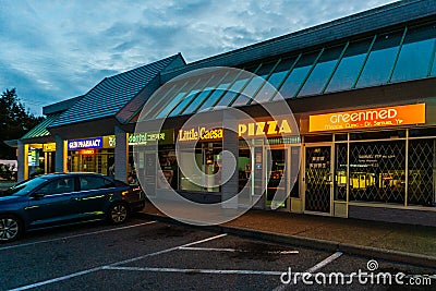 COQUITLAM, CANADA - OCTOBER 01, 2019: Little Caesar pizza and other stores Coquitlam Centre Shopping Mall Editorial Stock Photo