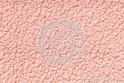 Coral fluffy background of soft, fleecy cloth. Texture of textile closeup. Stock Photo