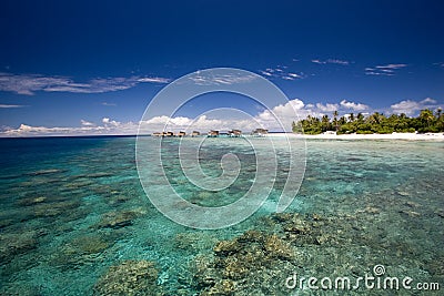 Coral reef and island Stock Photo