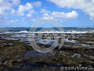 Coral Rock along shore of Kaihalulu Beach Stock Photo