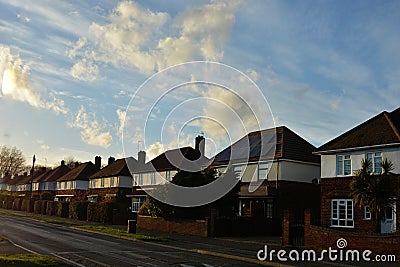 Corby, England. November 13 - Brick village traditional houses at sunset. Stock Photo
