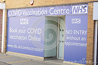 Corby, England 01.04. 2021 vaccination centre entrance building, blue and white sign outdoor Editorial Stock Photo