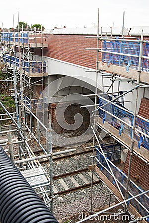 Corby, United Kingdom - August 29, 2018: old classical brik english building. Carried out scheduled repair work on the reconstruct Editorial Stock Photo
