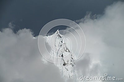 Cordillera Blanca, mountain in dark clouds Stock Photo