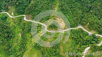 Cordillera on Luzon Island, Philippines, aerial view. Mountains are covered by rainforest and road. Stock Photo