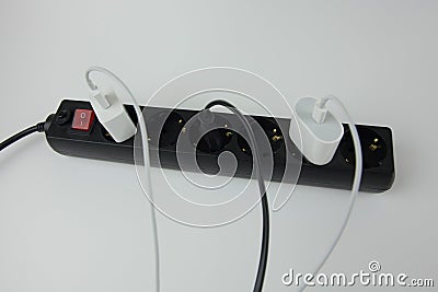 Cords for charging a phone connected Stock Photo