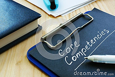Core competencies list on the black page Stock Photo