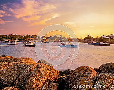 Corea Harbor glows at sunset in Maine , USA Stock Photo