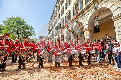 Philharmonic musicians playing in Corfu Easter holiday celebrations among crowd, Ionian, Greece Editorial Stock Photo