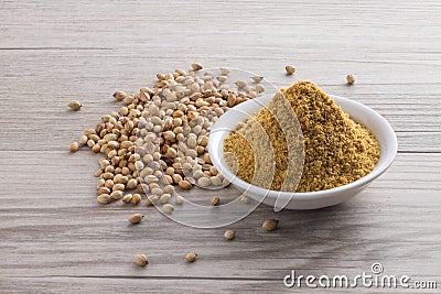 Coriander seed and powder Stock Photo