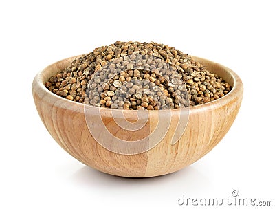 Coriander seed in the wood bowl on white background Stock Photo