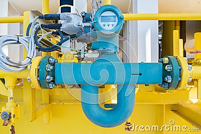 Coriolis flow meter or mass flow meter for measurement of oil and gas fluids quantity. Stock Photo