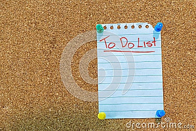 Cork board with a to do list note on it Stock Photo