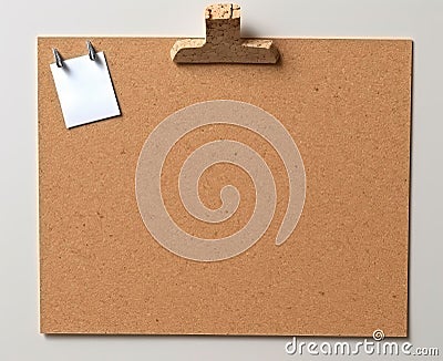 Cork board with white sticky notes or sheets of note paper. Stock Photo