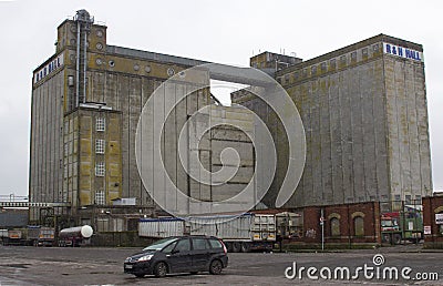 Cork City Harbour Ireland The historic R & H Hall Grain Silo constructed of Mass Concrete on the Kennedy Quay during a late winter Editorial Stock Photo
