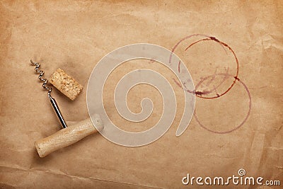 Cork and corkscrew with red wine stains Stock Photo