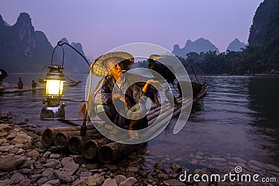 Cormorant fisherman on the Li River Editorial Stock Photo