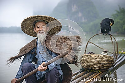 Cormorant Fisherman Editorial Stock Photo