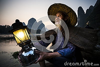 Cormorant fisherman portrait Stock Photo