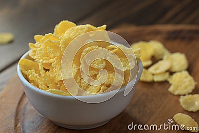 Corn flakes in bowl - cereal breakfast. Stock Photo