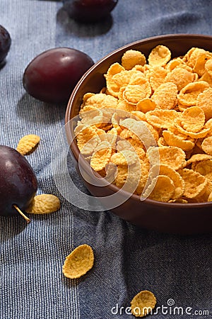 Corn flakes in a bowl with fruit, close-up Stock Photo