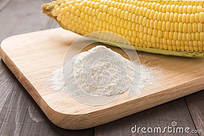 Corn flour and corn on wooden table Stock Photo