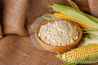 Corn flour on a dark rustic background Stock Photo