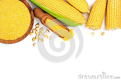 Corn groats or cornmeal in wooden bowl and corncob isolated on white background. Top view. Flat lay Stock Photo