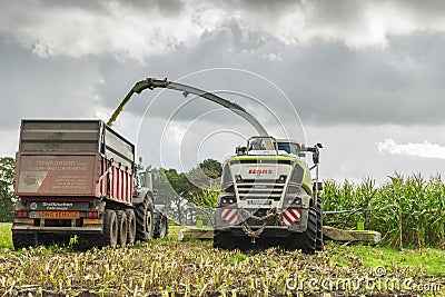 Corn harvest vehicles frontal rear 2 Editorial Stock Photo