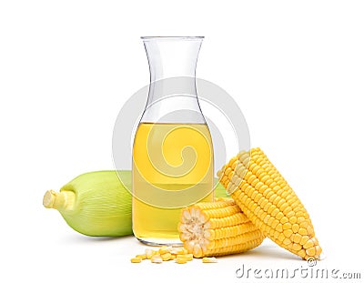 Corn oil in glass bottle with broken corn in half Stock Photo