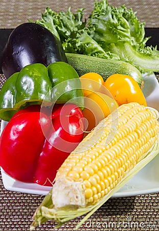 Corn, paprika, cucumber and lettuce. Stock Photo