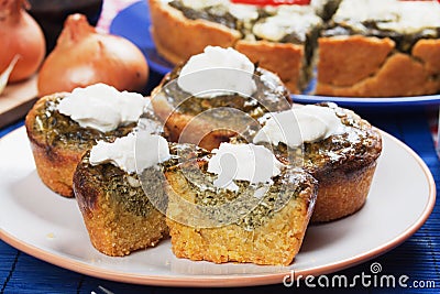 Corn pone with spinach and cream Stock Photo