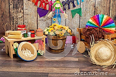 Corn, popcorn and straw hat. Typical table arrangements for the Brazilian Festa Junina - June Festival. Stock Photo