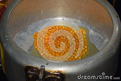 Preparing or making Popcorn Stock Photo