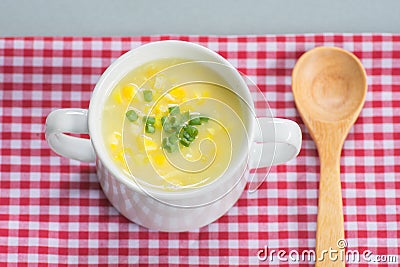 Corn soup in white bowl Stock Photo