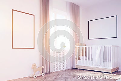 Corner of baby`s room with a crib, toned Stock Photo