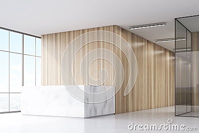 Corner of an office hall with a marble reception counter, wooden walls and a panoramic window. Stock Photo