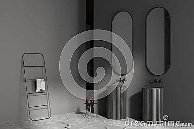 Corner view on dark bathroom interior with two mirrors, sinks Stock Photo