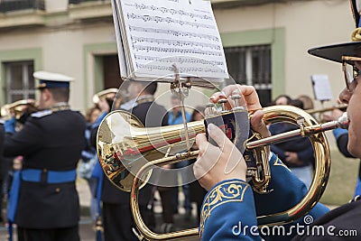 Cornet musician playing at procession Editorial Stock Photo