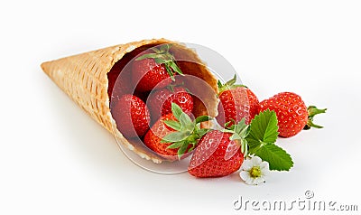 Cornet wafer ice cream cone with ripe strawberries Stock Photo