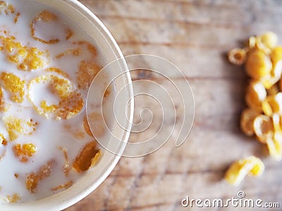 Cornflakes Breakfast with milk in a cup Stock Photo