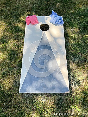 Cornhole yard lawn game boards and bean bags Stock Photo