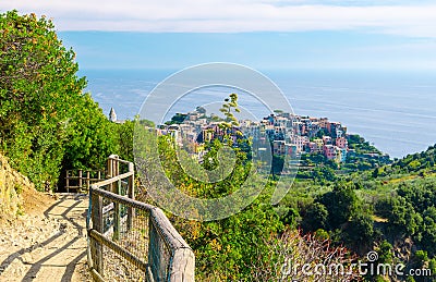 Corniglia traditional typical Italian village with colorful multicolored buildings houses on rock cliff and Genoa Gulf, Ligurian S Stock Photo